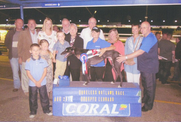 Val, with grandson, collecting Lenny's trophy August 2013