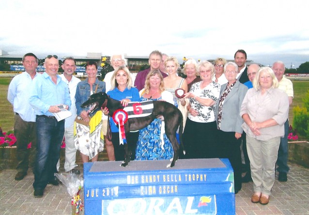 Club members Lisa and Lee presenting Lima Oscar sponsored trophy July 20th